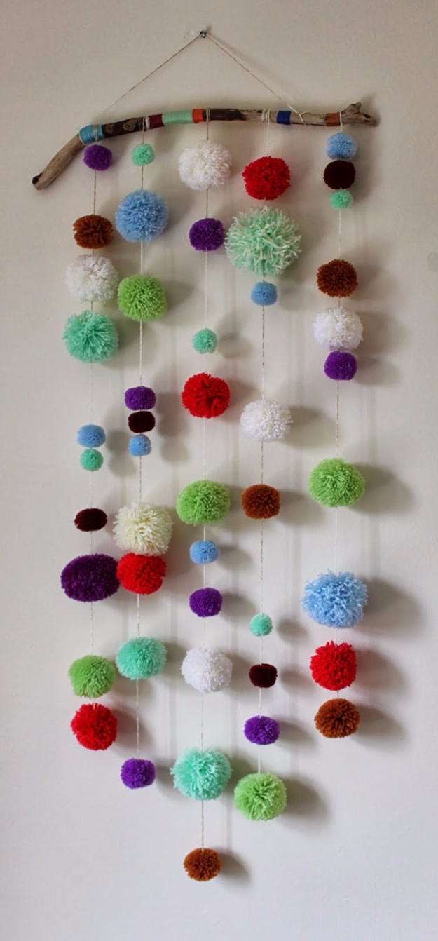 DIY Crafts with Pom Poms - DIY Driftwood Pom Pom Wall Hanging - Fun Yarn Pom Pom Crafts Ideas. Garlands, Rug and Hat Tutorials, Easy Pom Pom Projects for Your Room Decor and Gifts http://stage.diyprojectsforteens.com/diy-crafts-pom-poms