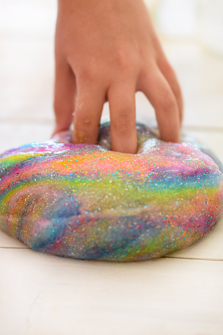 How To Make Rainbow Slime - Fun Sensory Play and Cool Stretchy Glittery Slime Can Be Made in Minutes- Quick Crafts for Children - Cool and Easy Crafts for Kids and Teens - Ingredients and Step by Step Tutorial for Making Slime At Home - Cheap DIY Projects for Teens and Teenagers - Girls and Boys Love Making Slime