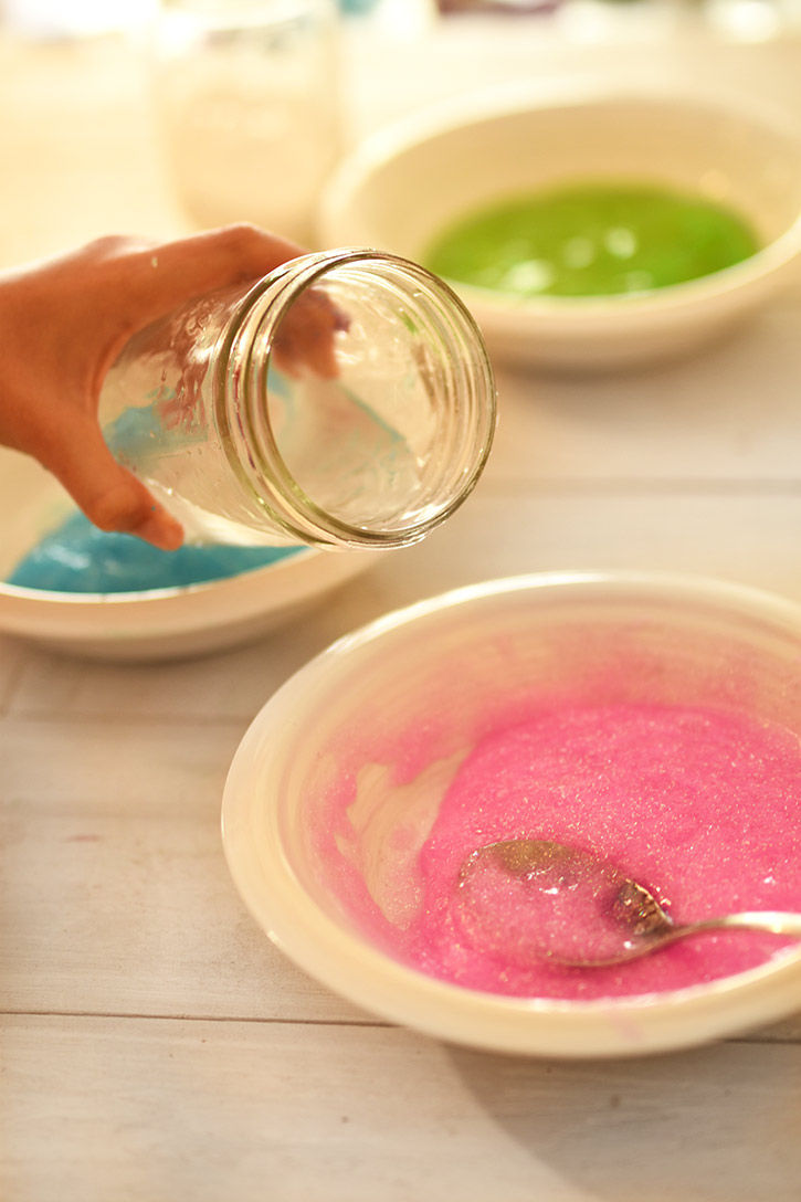 How To Make Rainbow Slime - Add A Mixture of Borax and Water to the Elmers Glitter Glue Into A Bowl - Cool and Easy Crafts for Kids and Teens - Ingredients and Step by Step Tutorial for Making Slime At Home - Cheap DIY Projects for Teens and Teenagers - Girls and Boys Love Making Slime